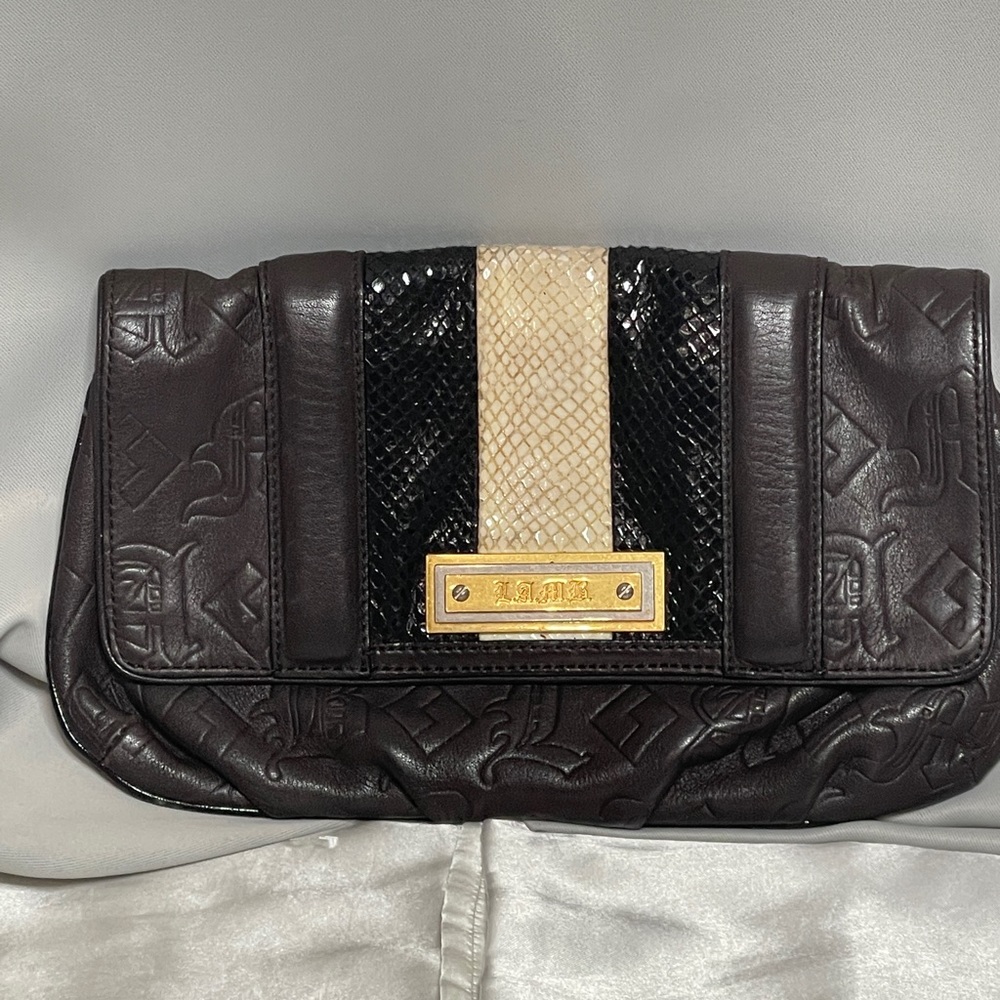 Vintage Lamb Bag…..how can you not grab this one. “Gwen Stefani”